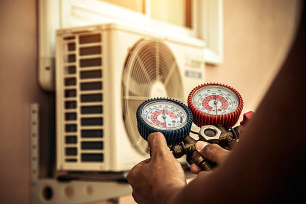 Professional Hvac technician working in Zebulon, NC